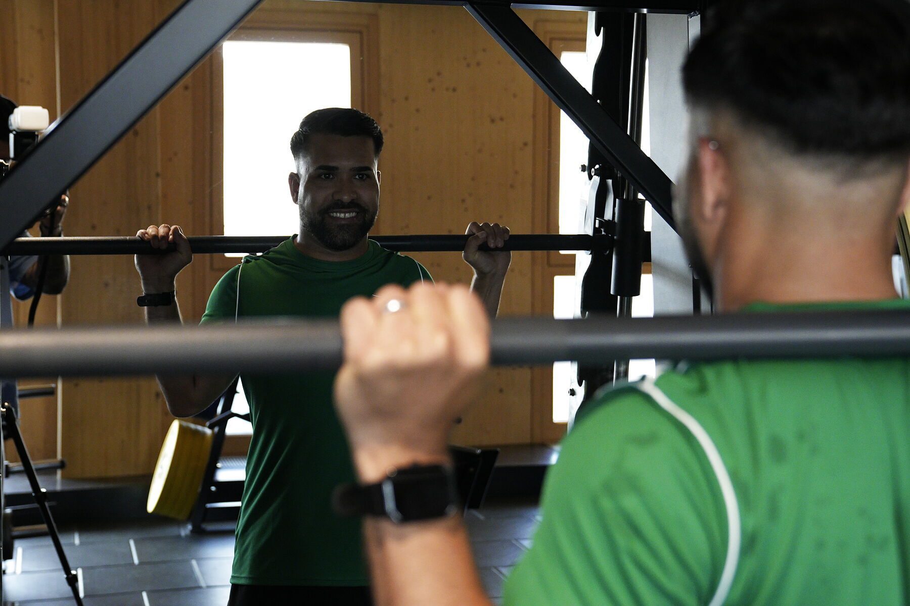 Training mit Klient an der Langhantel